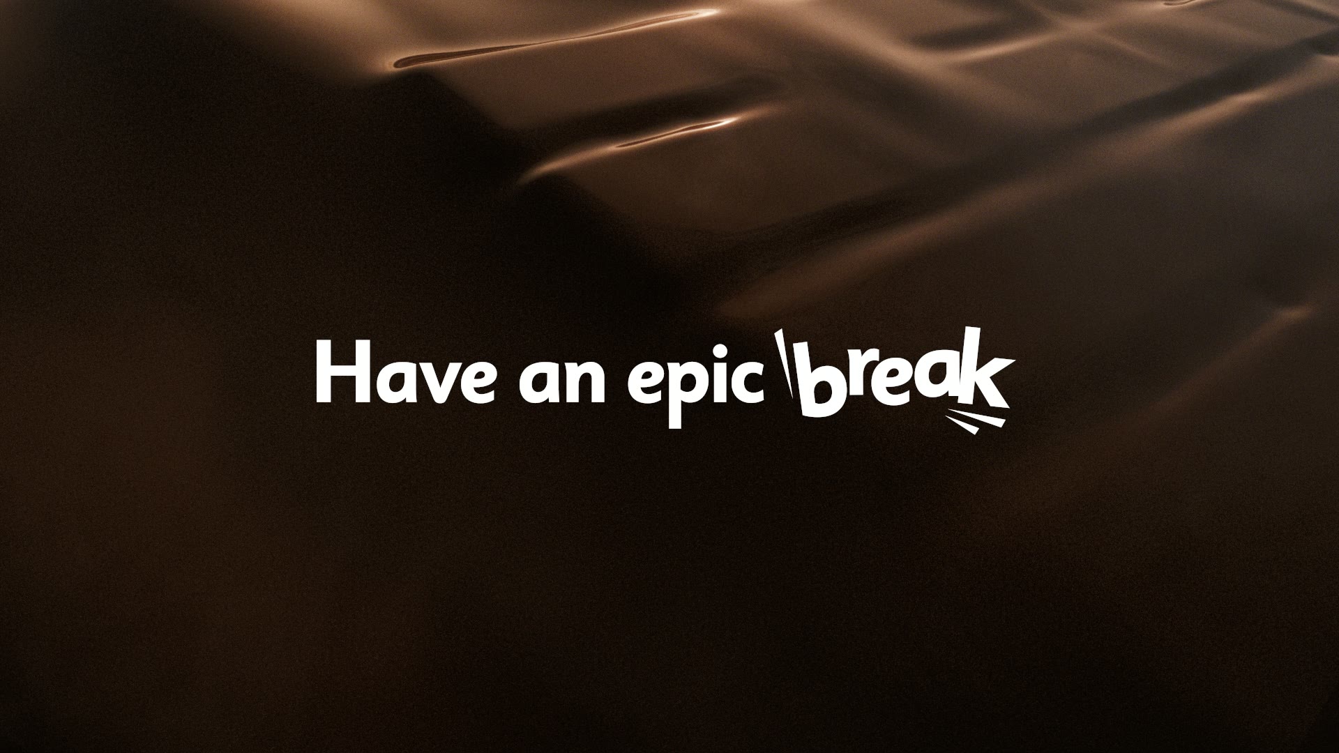 Een golvend chocoladeoppervlak met de tekst Have an epic break.